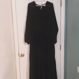 Maxi black sheer dress. Bottom half pleated.